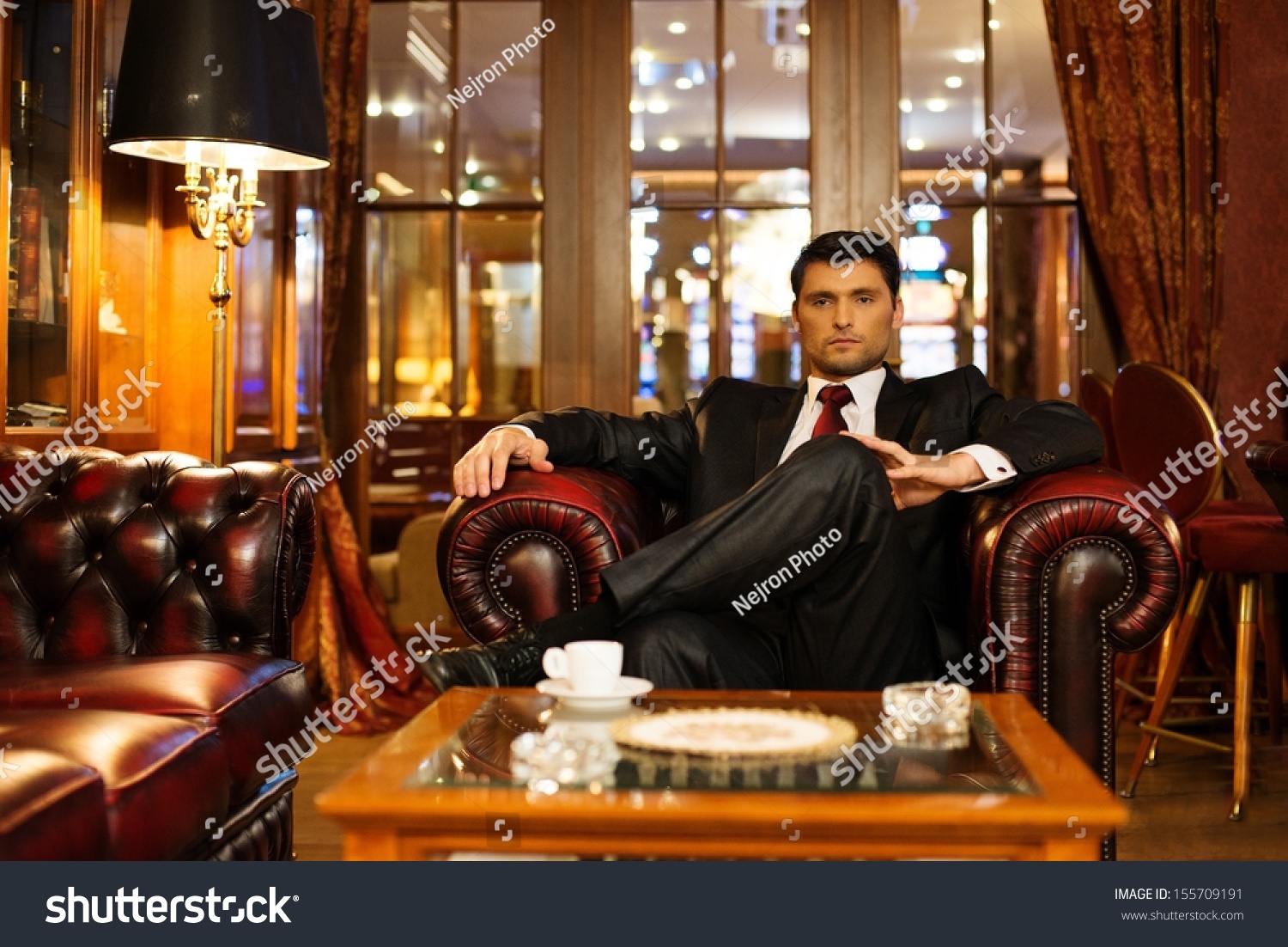 highly-compensated-employee-sitting-in-leather-chair