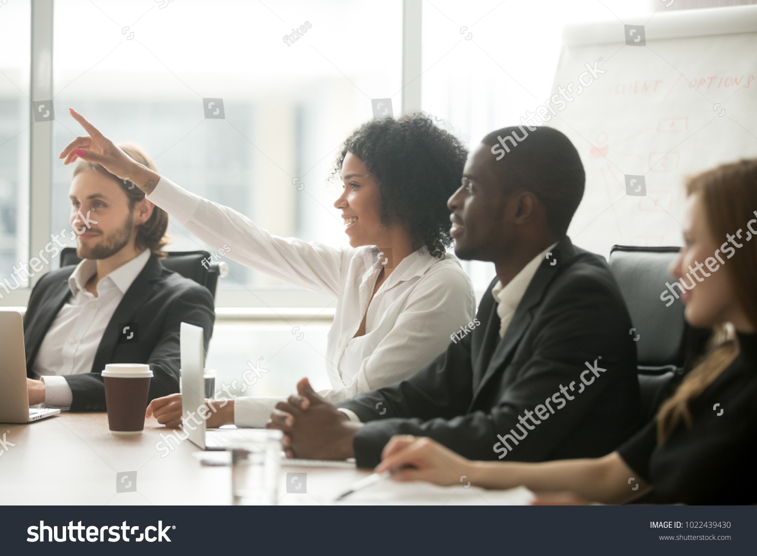 african-american-female-asking-question-during-meeting